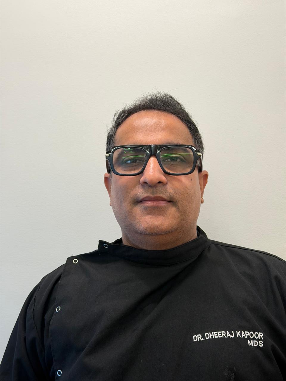 Dr. Dheeraj Kapoor, Prosthodontist at Poly Dental Clinic Mohali